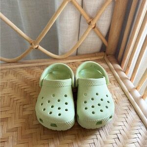 Pale green toddlers crocs